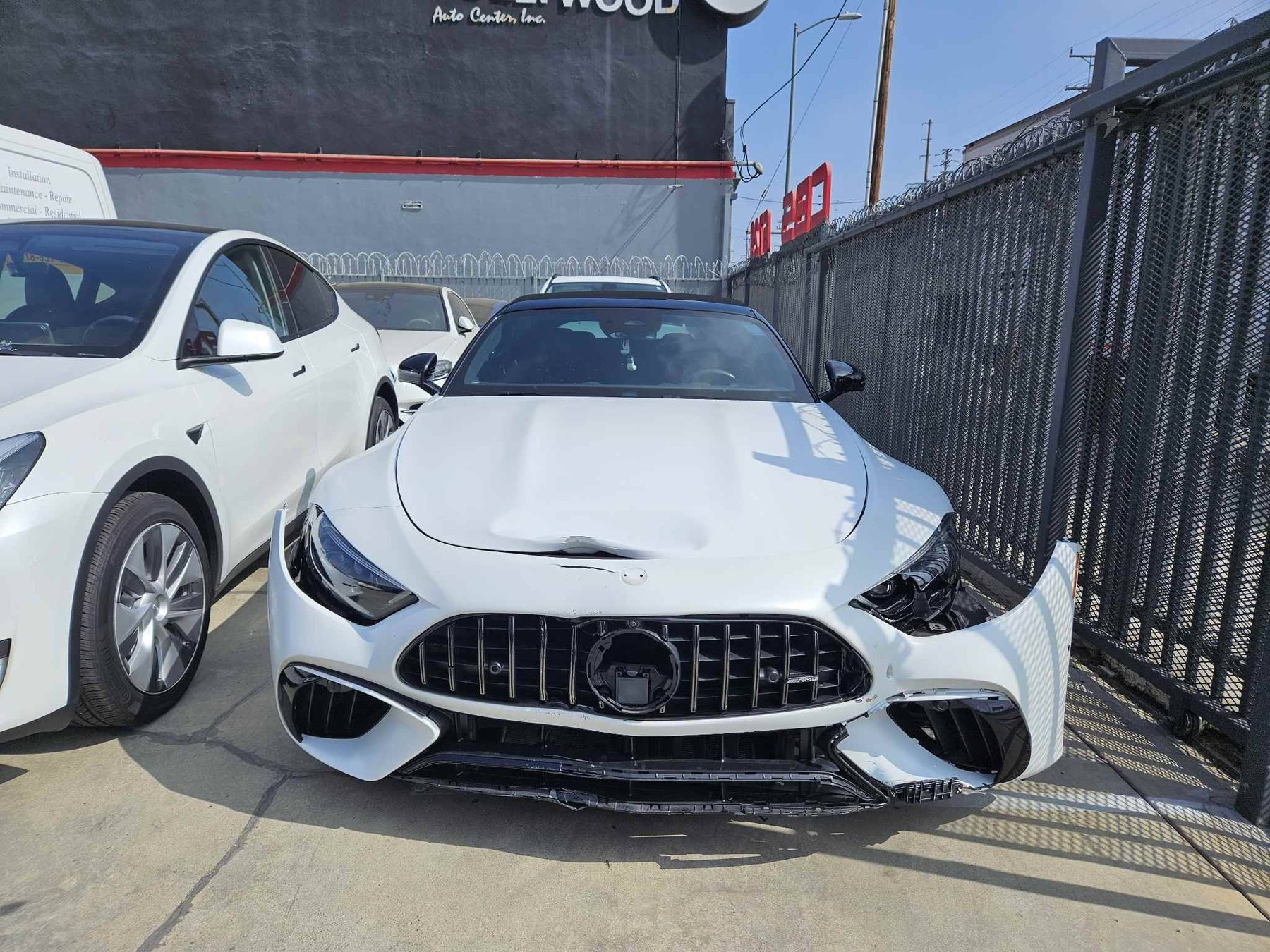 Mercedes-AMG SL with front-end collision damage awaiting certified repair